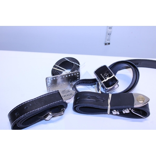 328 - A selection of new quality branded  leather belts