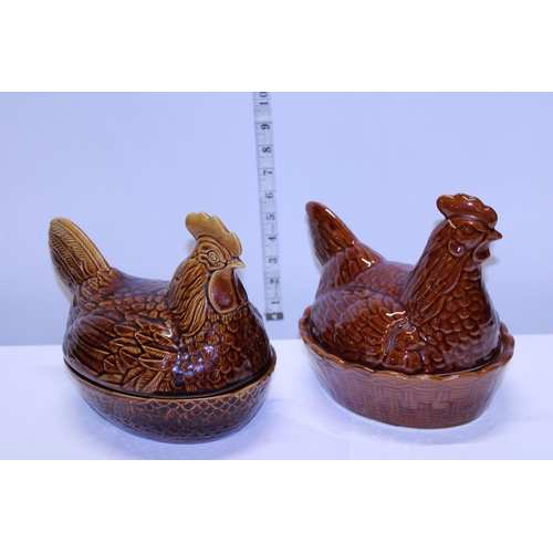 52 - Two ceramic chicken form egg baskets shipping unavailable