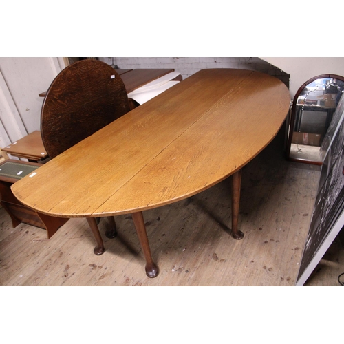 73 - A late 18th/early 19th century oak double drop leaf hunt table L240cm, approx 160cm with both leaves... 