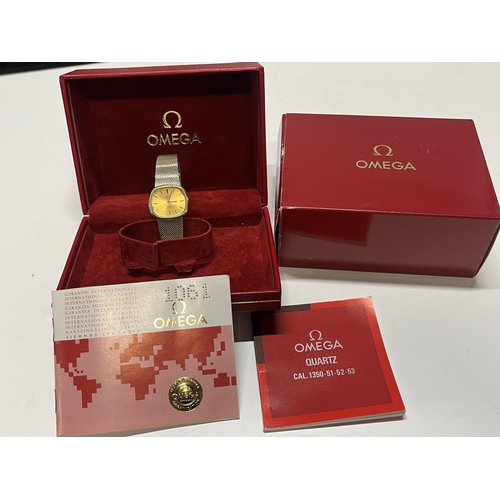 210 - A boxed ladies Omega Deville gold plated quartz watch with paperwork (untested)