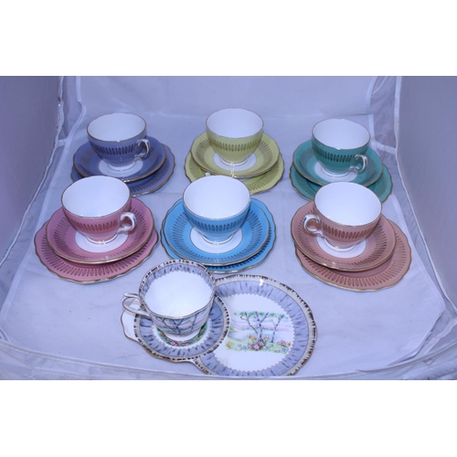 140 - A selection of Colclough bone china trio's and a Royal Albert tea for one set