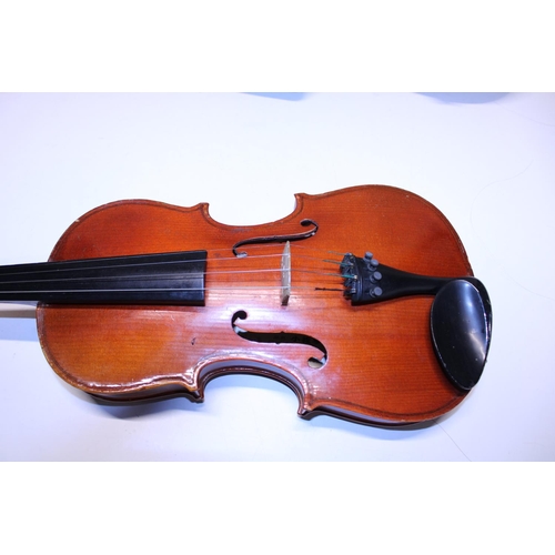 326 - A cased Violin and bow