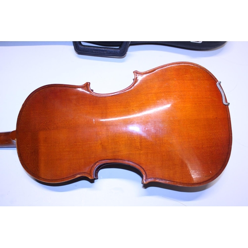 326 - A cased Violin and bow