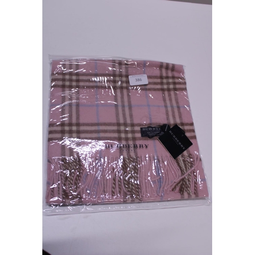 390 - A new with tags Burberry 100% lambs wool pink long scarf 166 x 38cm