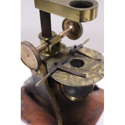 5 - A antique Victorian boxed brass microscope with alternate bullseye magnifier and accessories