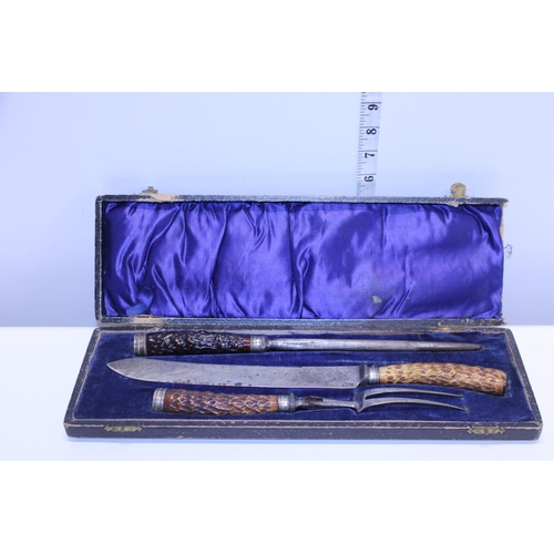 302 - A antique cased horn handled carving set a/f