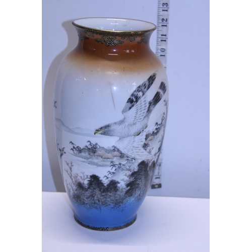 306 - A hand painted Oriental vase with six character marks to base h31cm