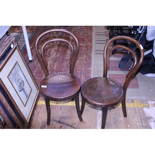 82 - A pair of early 20th century children's bentwood bistro chairs. Shipping unavailable