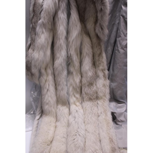 413 - A ladies fur coat size 14