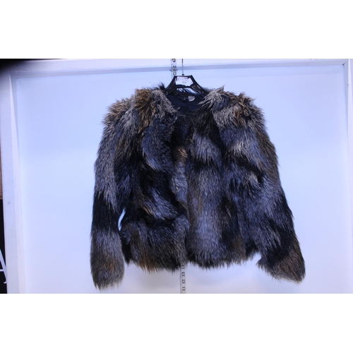 415 - A ladies fur jacket size 34