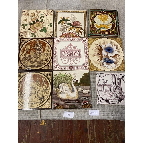 252 - A selection of antique ceramic tiles