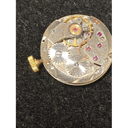 96 - An 18ct Gold Ladies Rolex in a Rolex clam box, a Ladies Tudor movement with a 9ct back, a Tudor box ... 