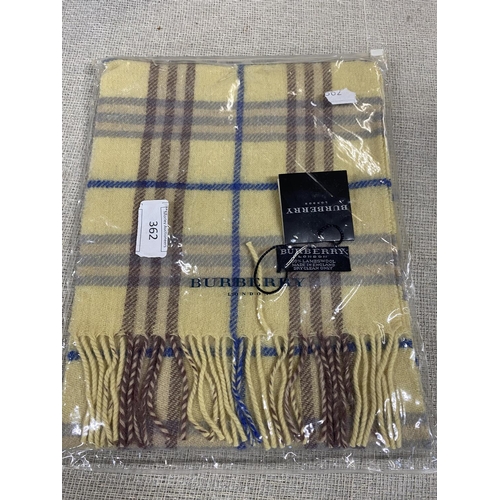 142 - A new with tags Burberry 100% lambs wool yellow long scarf 120 x 23cm