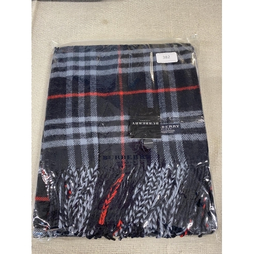 129 - A new with tags Burberry 100% lambs wool Navy shawl 206 x 70cm