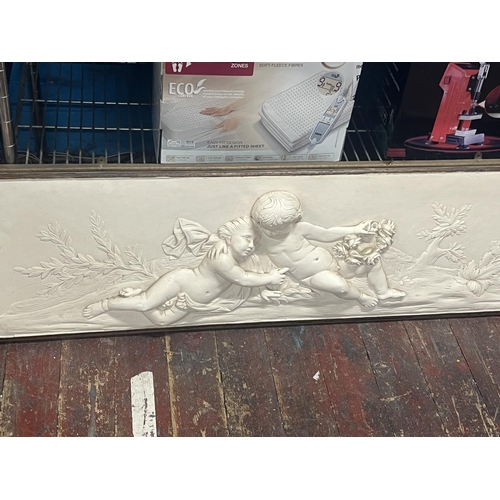 101 - A large framed plaster Cherub themed wall plaque. Shipping unavailable