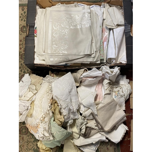 192 - A large selection of vintage linen etc