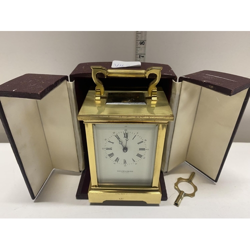 21 - A Taylor and Bligh Carriage Clock boxed with key