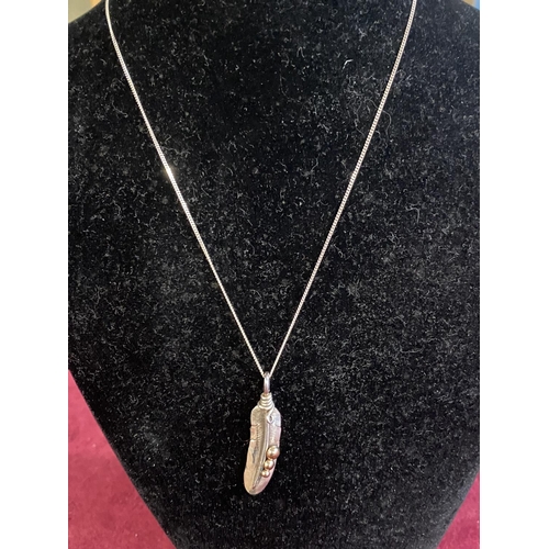 254 - A handmade 'Little Feathers, St Agnes, Cornwall' Silver necklace and pendant