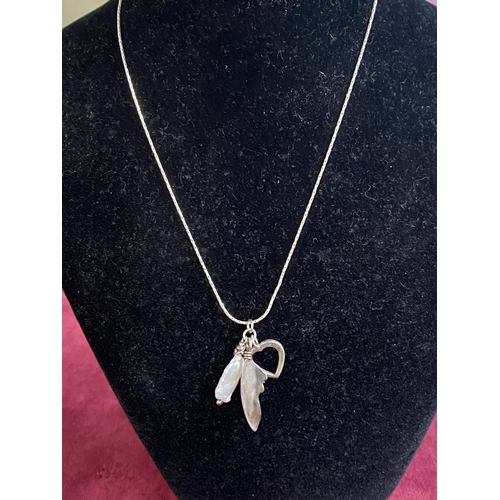 259 - A handmade 'Little Feathers, St Agnes, Cornwall' Silver necklace and pendant