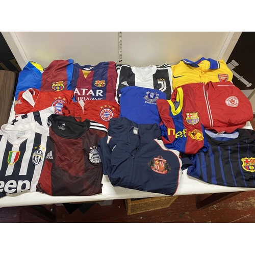 326 - A job lot of mixed football shirts