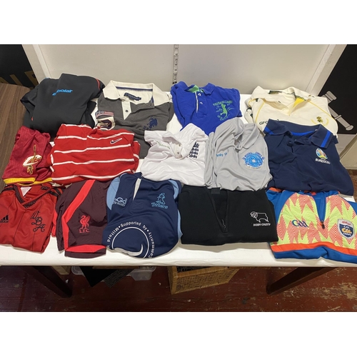 327 - A job lot of mixed sports shirts