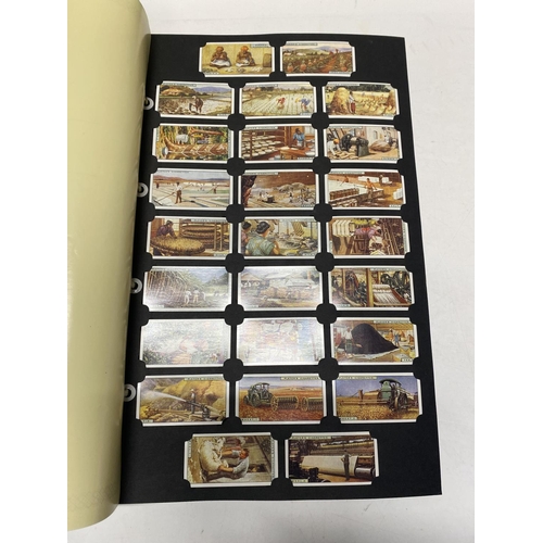 345 - A card collectors society folder full of reprint cigarette cards