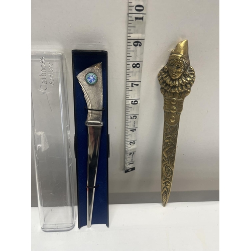 39 - A boxed Caithness paperknife and a vintage brass paperknife