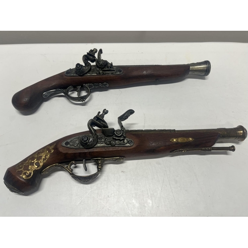 44 - Two wall hanging flintlocks