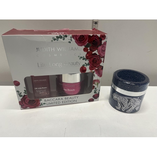 49 - A boxed Judith Williams cosmetic gift set and a new Prai beauty cream