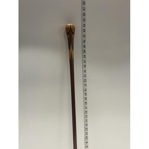 62 - A vintage mixed wood walking cane