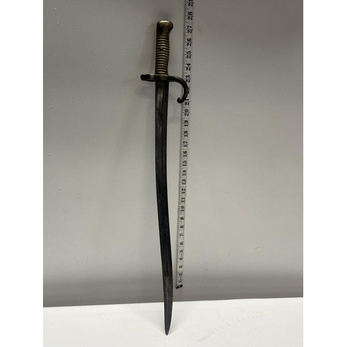 63 - A Chassepot bayonet engraved for 1868, no scabbard over 18's only. No shipping