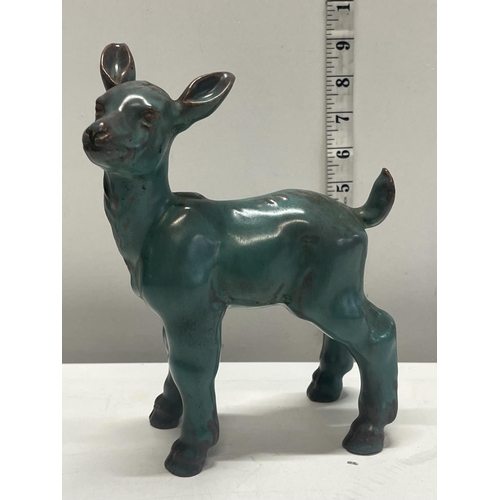 65 - A period pottery lamb