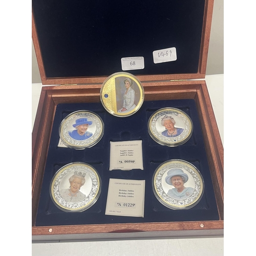 68 - A cased set of commemorative coins