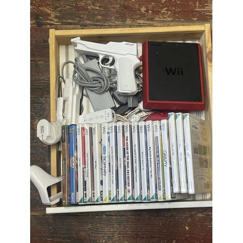 76 - A selection of Wii console, games and accessories