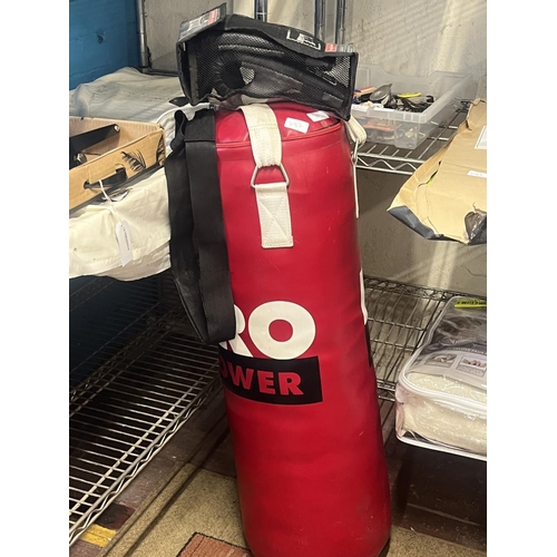 99 - A punch bag and gloves (shipping unavailable)