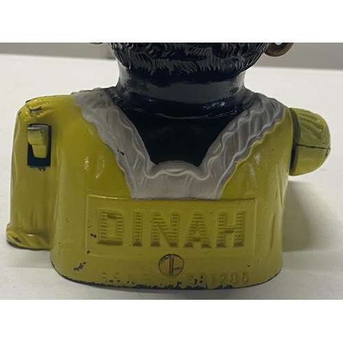 47 - A vintage Dinah  cast iron money box, REG581285