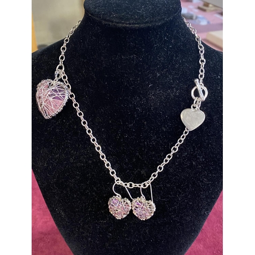 108 - A 925 silver pendant and chain with matching earrings