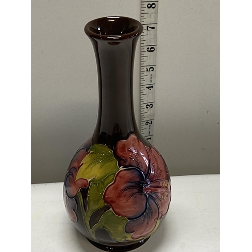 102 - A William Moorcroft vase Hibiscus pattern