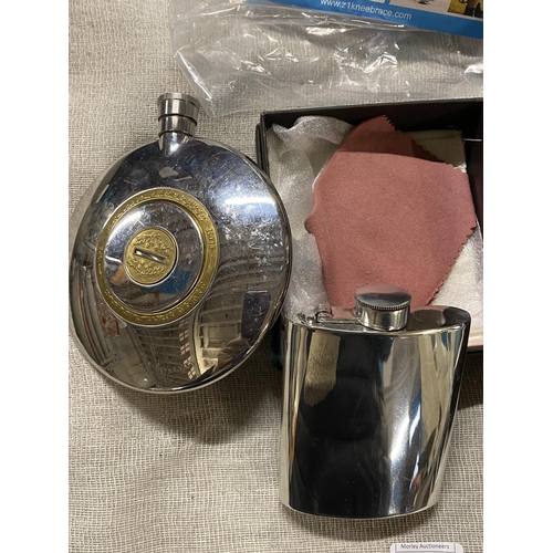 137 - Two hip flasks one boxed