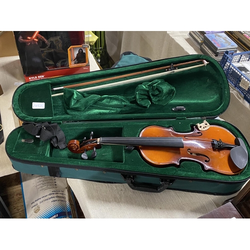 148 - A cased violin