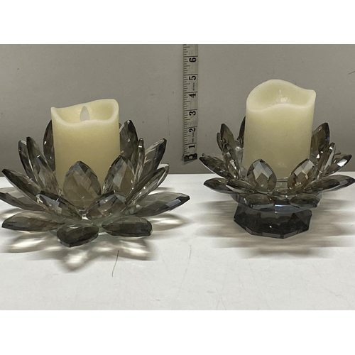 165 - A pair of Julian McDonald table glass candle holders