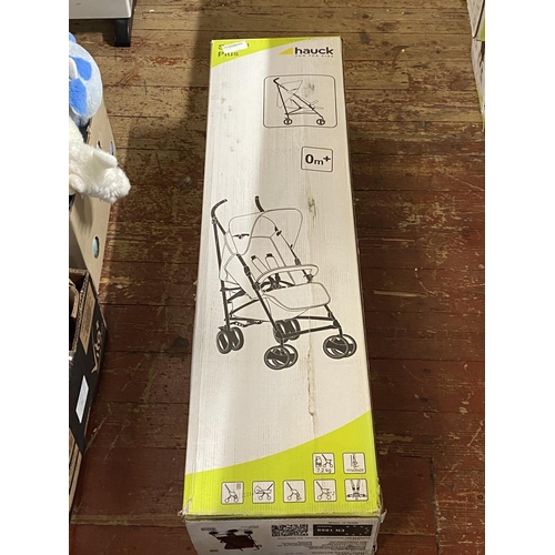 201 - A new boxed Hauck child's push chair (unchecked)