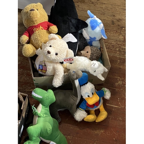 214 - A large selection of assorted soft toys