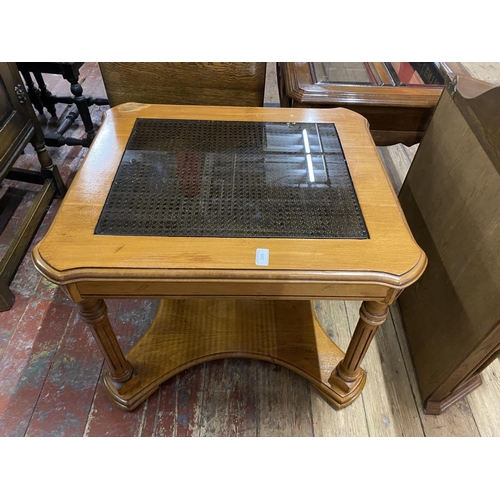 269 - A 1980's coffee table with glass insert, shipping unavailable