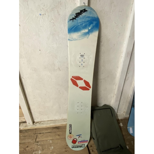 61 - A Burton snowboard and case, shipping unavailable