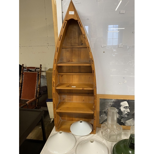 75 - A pine storage unit in the form of a boat, shipping unavailable