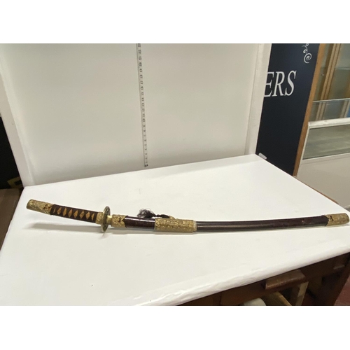 98 - A Japanese Kutani sword and scabbard, shipping unavailable (over 18's only)