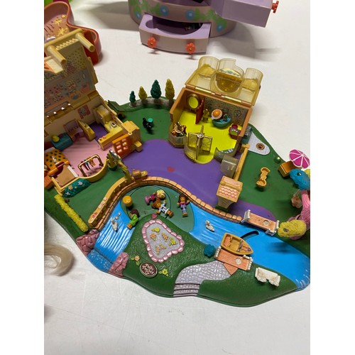 58 - A box of Polly Pockets, and other toys