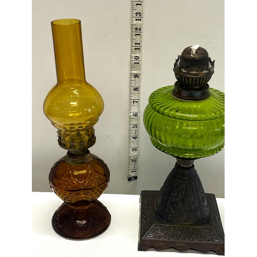 72 - Two small antique oil lamps