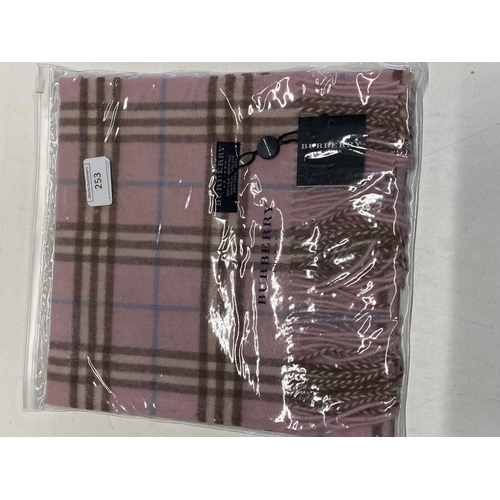 254 - A new with tags Burberry 100% lambs wool pink long scarf 166 x 38cm